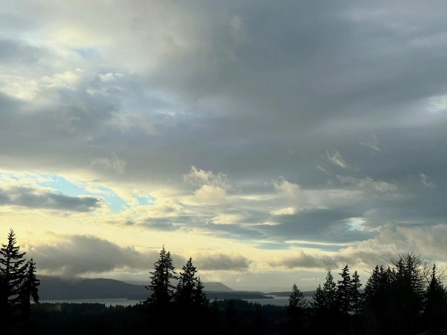 Watching the clouds from my windows, mesmerized by the formations, lit up by the setting sun, and then watching it change as the sun set behind the clouds and trees on the horizon, that is what brings joy to my days! 🌅