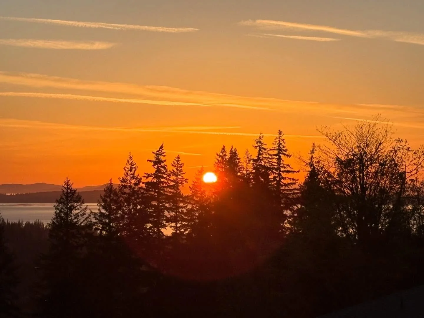 I&rsquo;ve been loving these bright spring sunsets in deep tones of orange with the sun sinking right in front of me! Also loving these warm, sunny days like yesterday (4/09) where I can relax on my balcony and soak in the view! 🌅