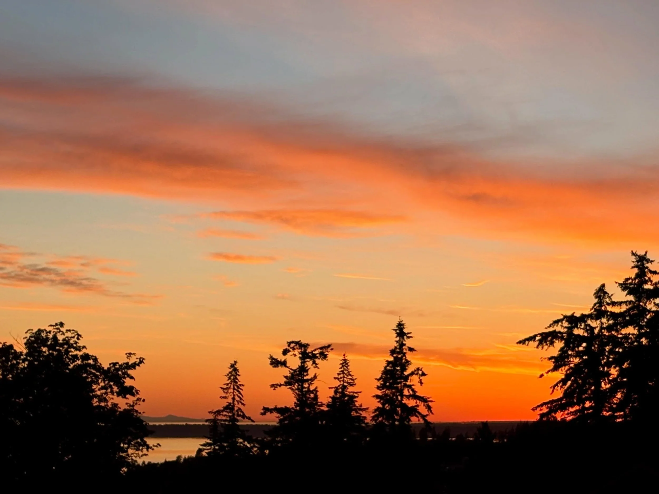 The other view of the sunset on June 1st without the pink cotton candy looking cloud. Not quite as eye catching, but still beautiful! 🌅
