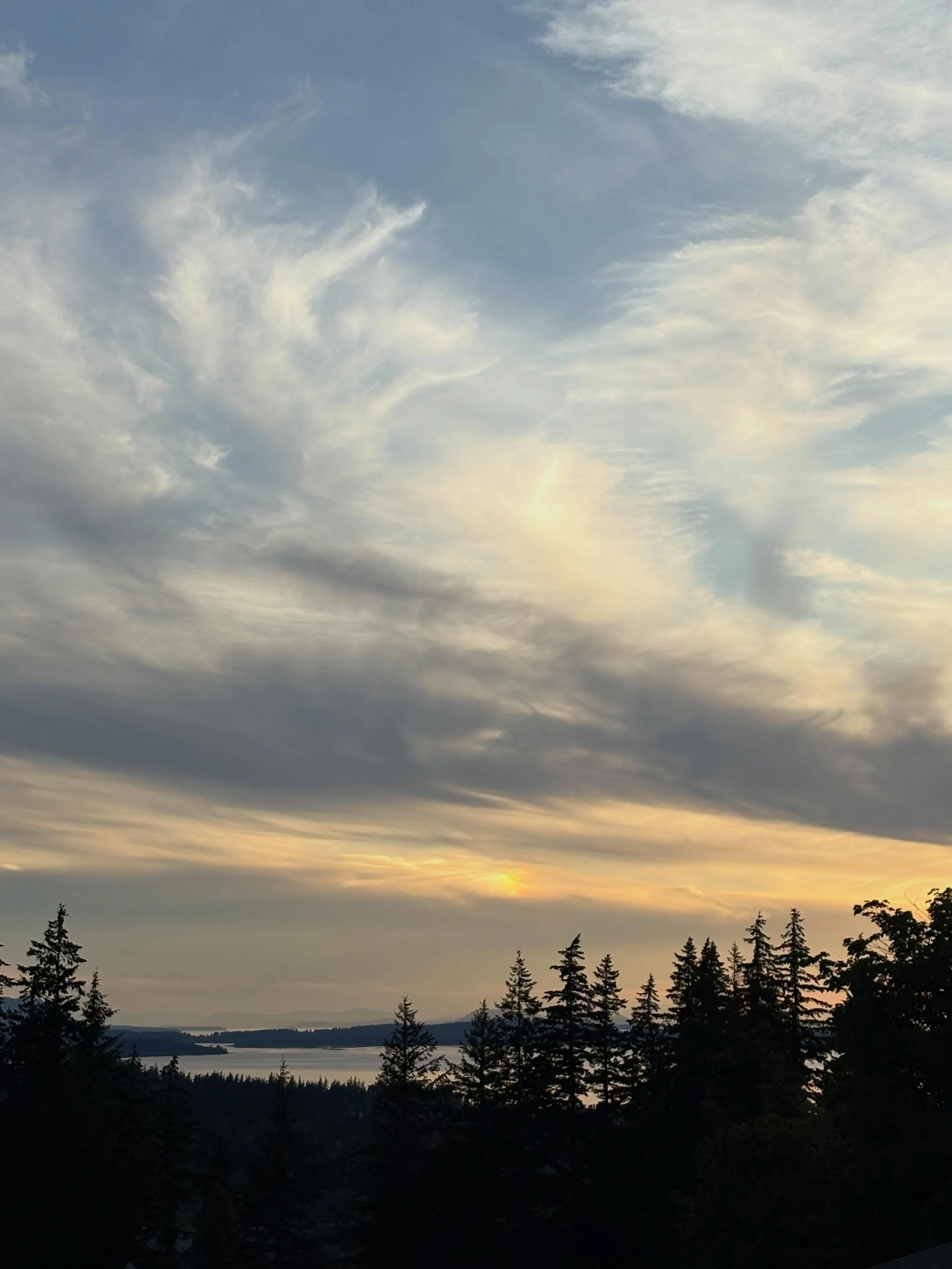 I was sitting outside on my balcony enjoying the sunny weather and view this past Tuesday (6/2) when a sun dog appeared in the sky! To the naked eye, it was a rainbow strip in between the clouds, but I couldn&rsquo;t quite capture that with my iPhone