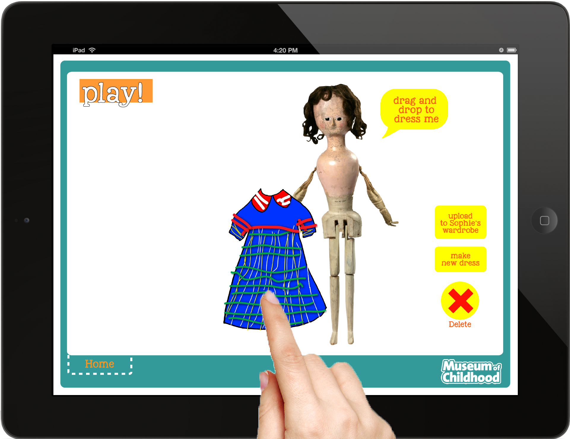 After designing a dress for Sophie doll, users drag their new dress to dress the doll.