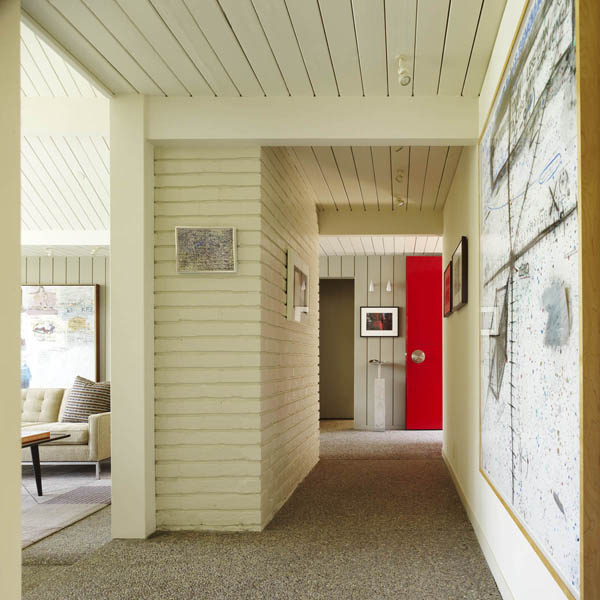 I'm crazy about this idea of the hallway tucked behind the living room fireplace. Matthew Millman Photography