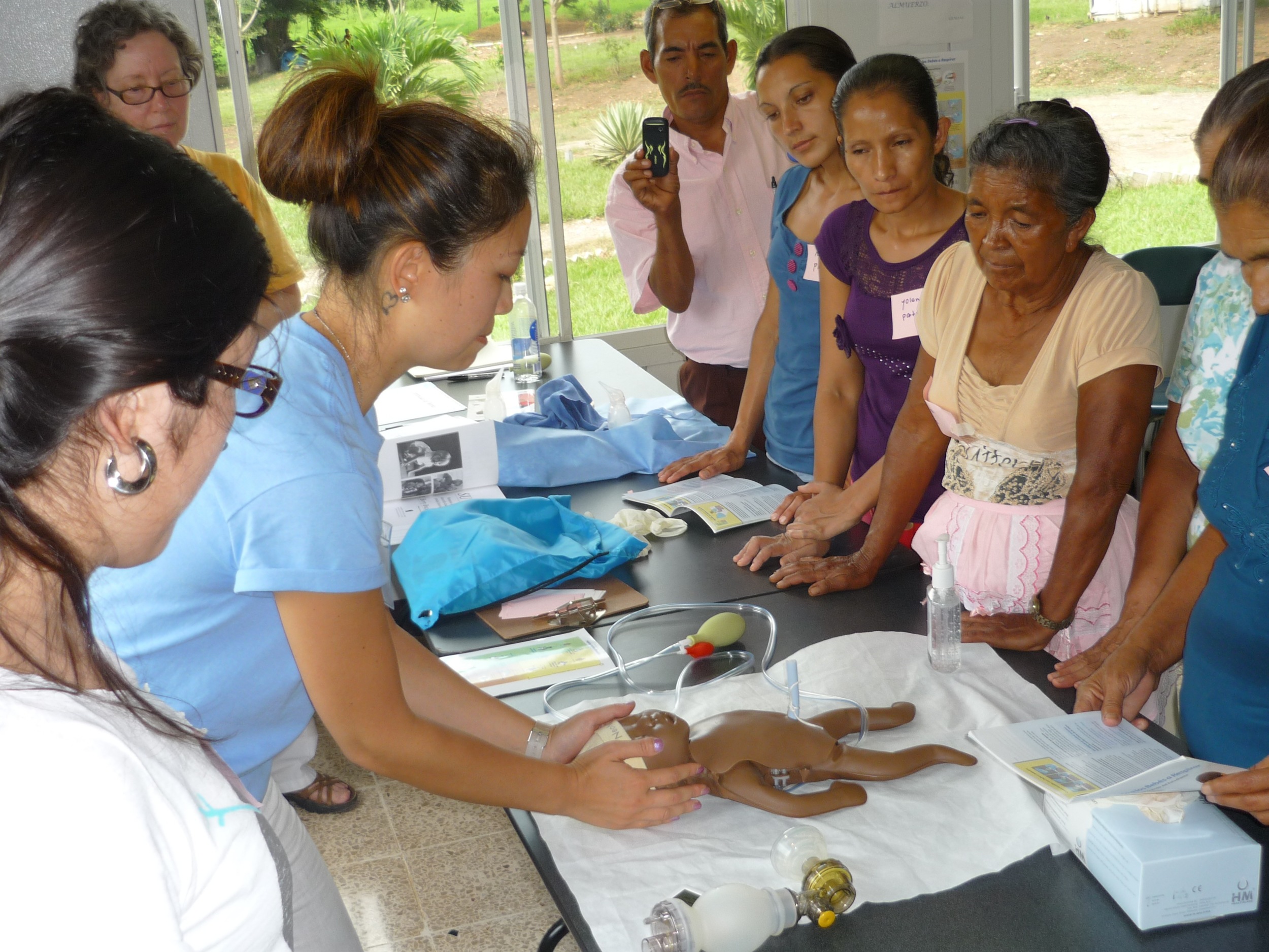 Members of the brigade from Allentown, PA conduct training for midwives from surrounding villages.