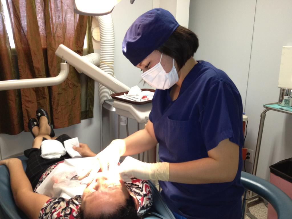 The dentists are now performing root canals to save teeth. They have also developed a dental care educational program for children in nearby schools.