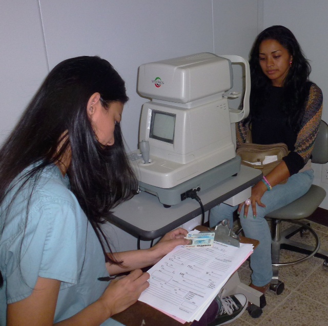 Karen Murillo, the former clinic receptionist, attended optometry school with a scholarship from Serving at the Crossroads. She graduated first in her class and has returned to the clinic to provide eye exams and glasses.
