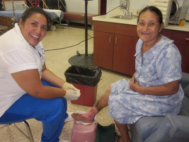 Nellie, a Honduran nurse working at the clinic, prepares a patient for topical hyberbaric oxygen therapy. We have seen incredible results using this treatment on severely ulcerated sores. Another patient had suffered for more than 20 years and had gone against doctors recommendations to amputate her leg. Bob and Mike saw her on their recent trip to the clinic. She was finishing her treatment, was pain free, and the sore healed. 