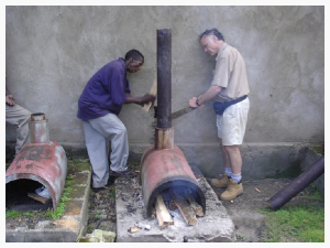 Tanzania fix water heater chimney.jpg