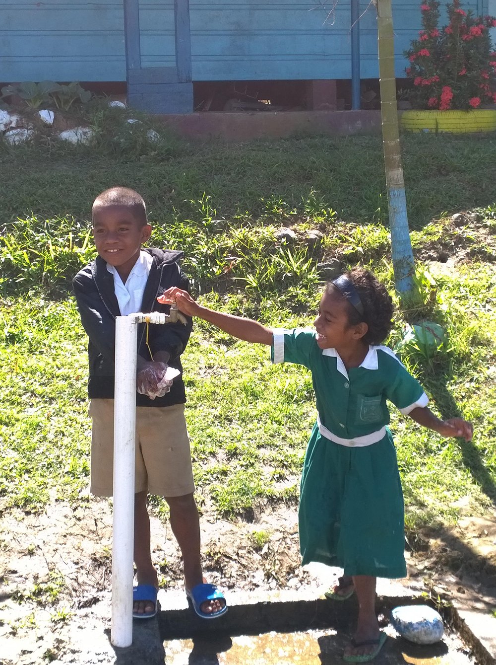 Pacific ‘Water For Life’ Programme - children washing hands under a tap