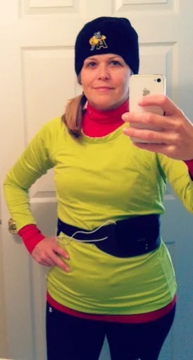 Knit hat, red Nike cold weather shirt, lime green Danskin long sleeve running shirt, leggings under my fleece-lined Champion running pants.