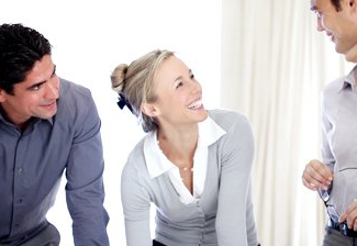 stock-footage-portrait-of-happy-business-team-discussing-new-project-together-at-office.jpg