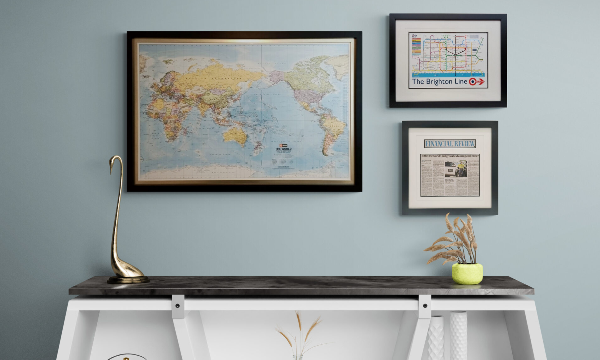 vintage world map in a black custom frame at Art Reflection, Mosman.