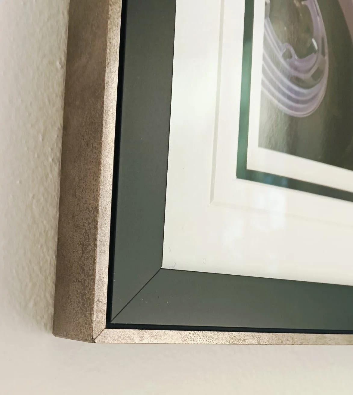 "Detailed view of layered custom framing and matboard selection, representing the design step at our Mosman gallery."