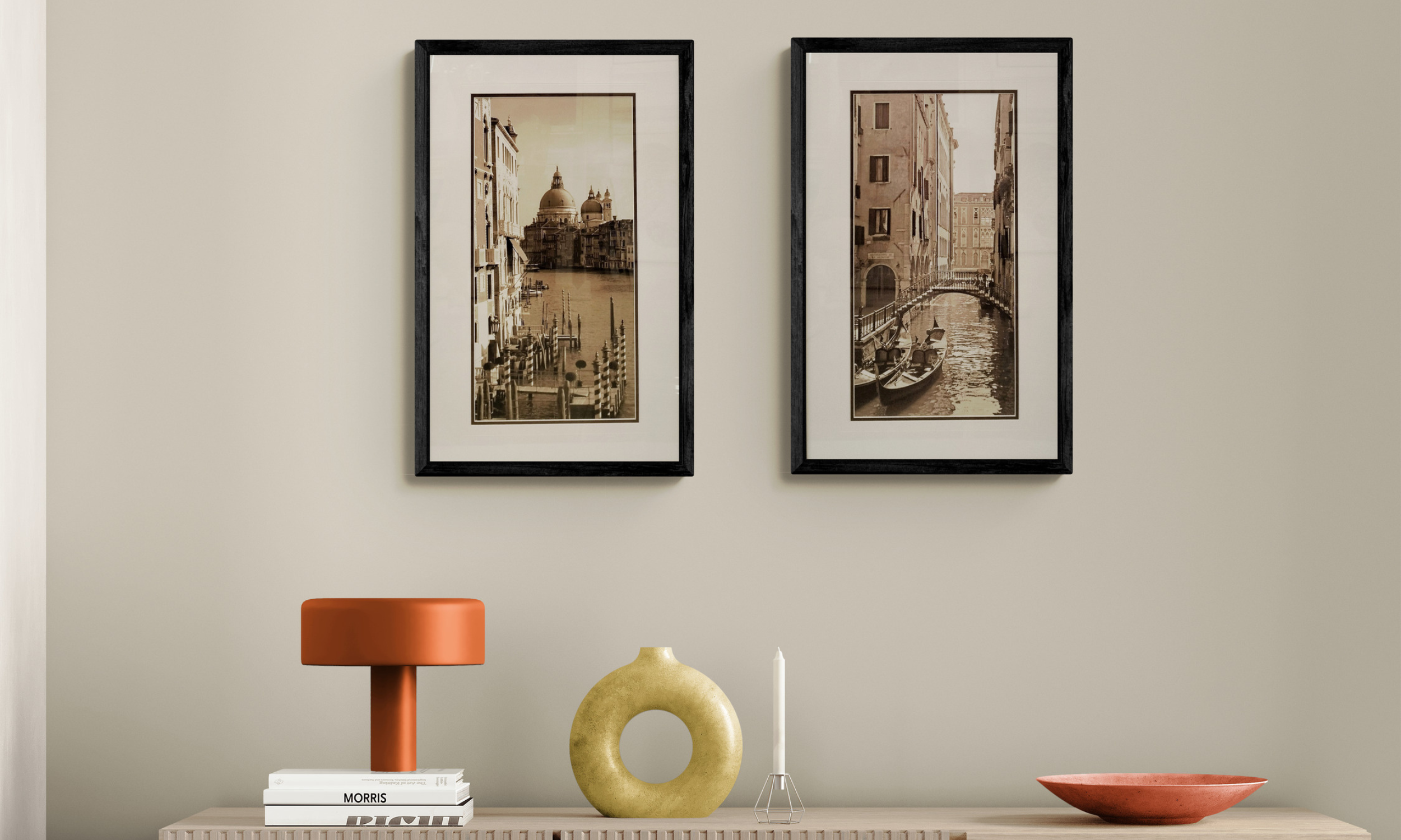Two black-framed landscape photography prints of Venetian canals professionally mounted at Art Reflection, Mosman.