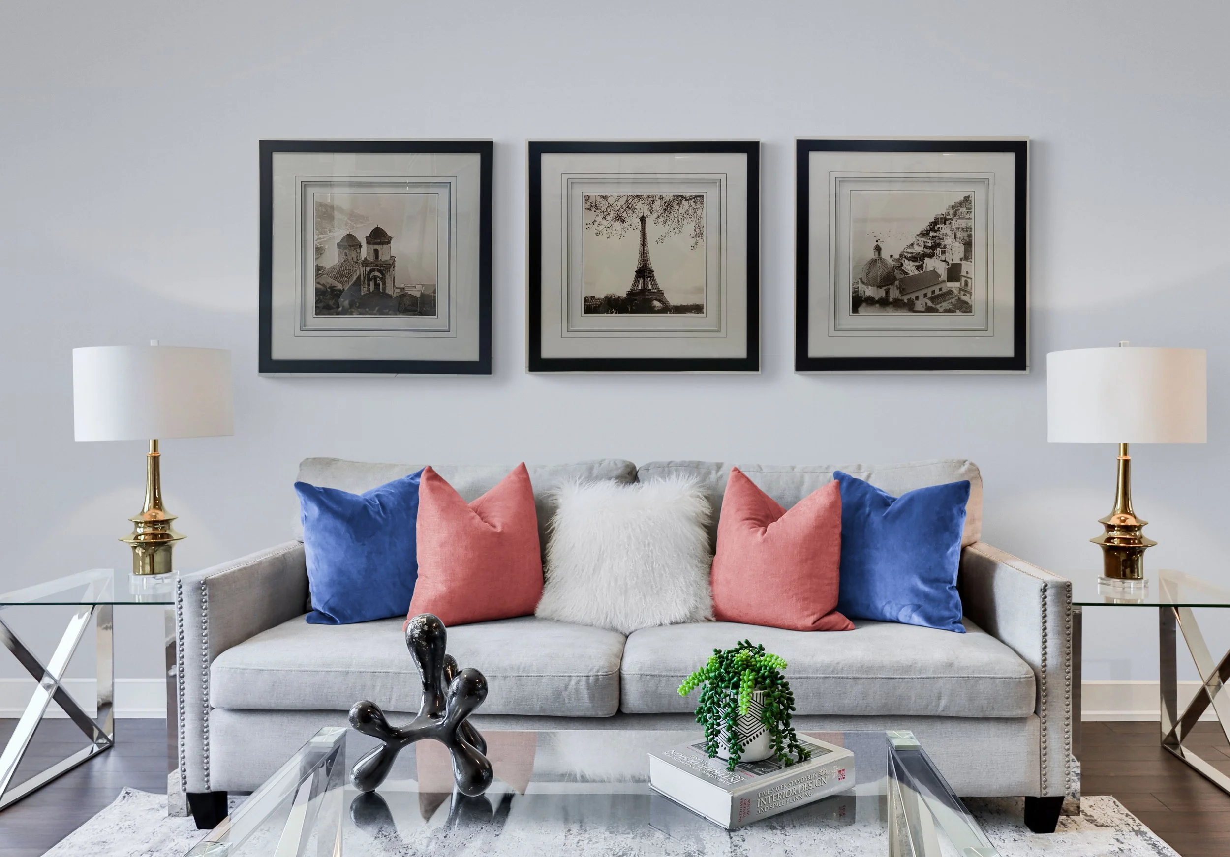 Framed black and white photography of European scenes displayed at Art Reflection Mosman gallery.