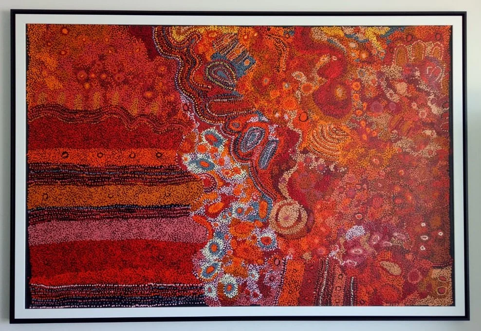 Aboriginal dot painting professionally stretched and finished with a modern floating timber frame.