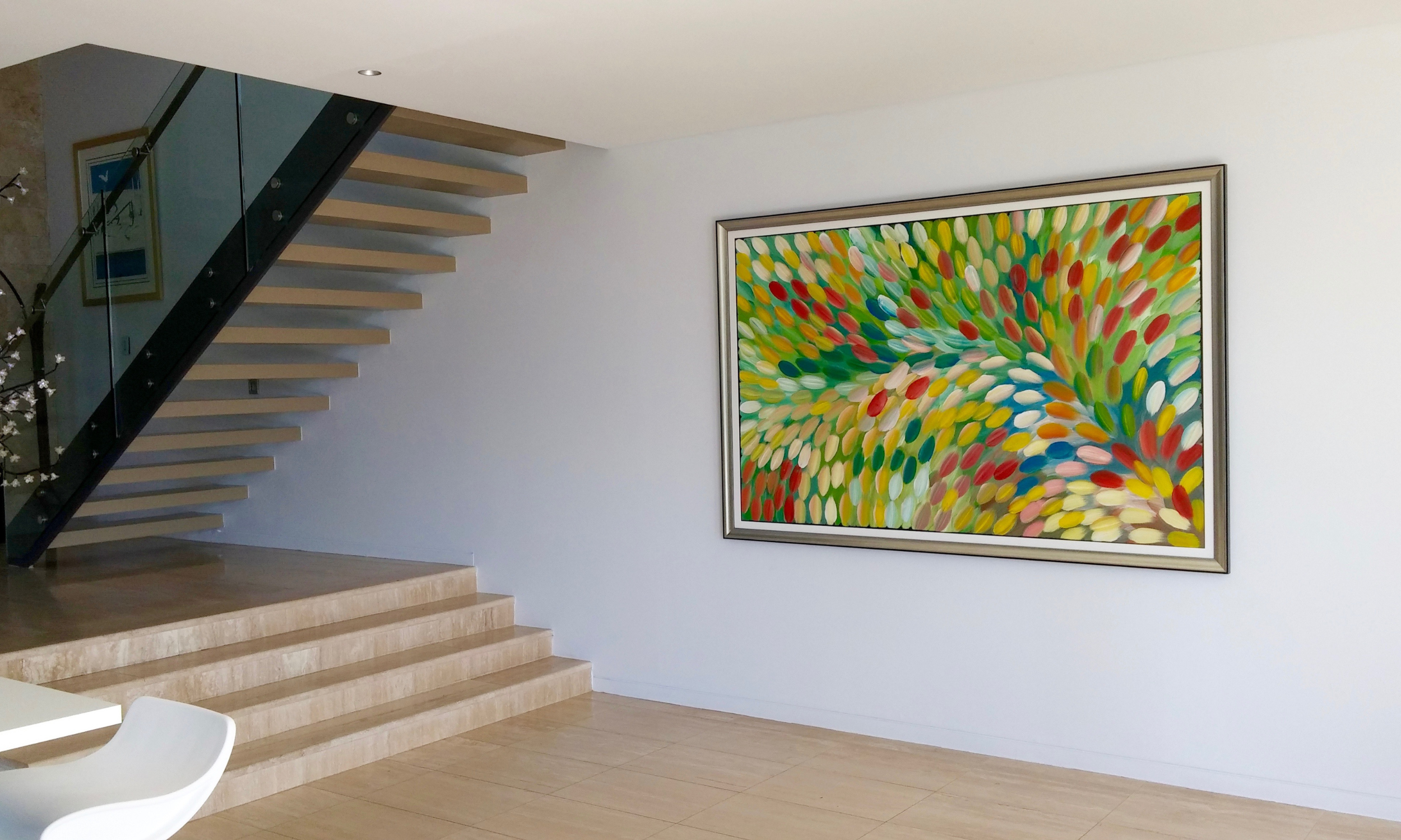 A curated display of original artworks featuring bespoke triple matting and master-crafted timber frames at the Art Reflection gallery in Mosman, Sydney