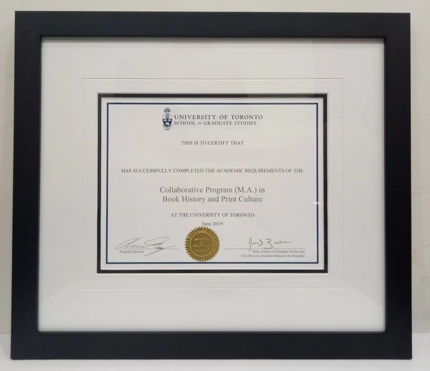 Custom framed university diploma using conservation-grade materials and elegant gold-trimmed molding.