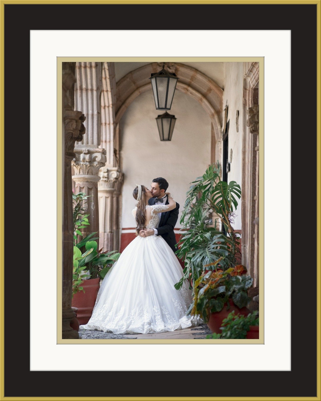 Elegantly custom framed wedding photography displayed with a classic gold and black moulding in Mosman
