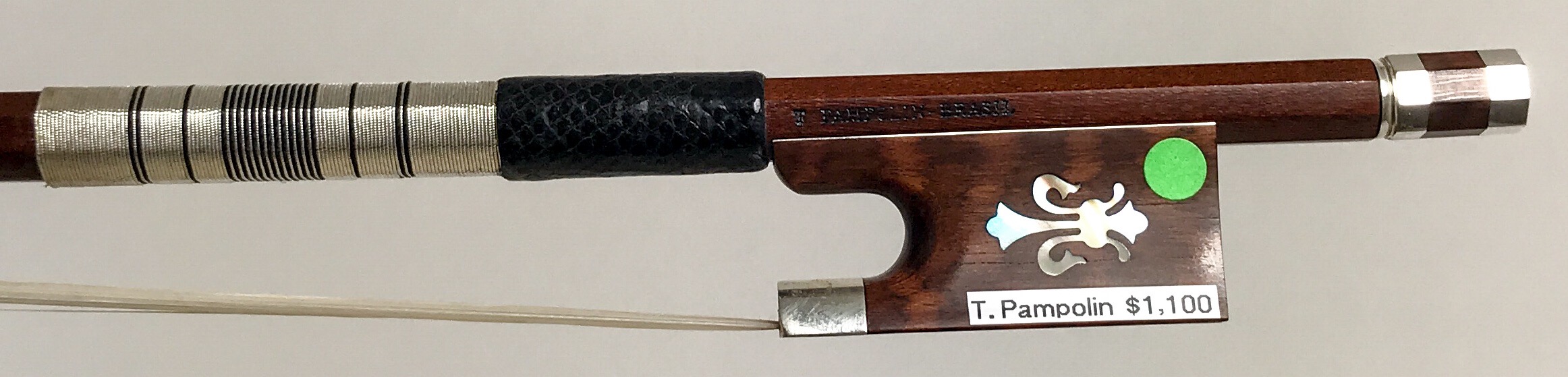 Arcos Brasil - VNS- Snakewood (assorted makers) Silver fitted choice Pernambuco sticks, fleur-de-lys inlayed, Snakewood or Horn frogs. Violin - $1,100 / Viola - $1,030 / Cello - $1,220 / Bass - $1,800 Specially designed frogs fitted with sterling silver can be found on our silver bows. Select quality straight grain wood blanks are effectively used by our bowmakers in the craft of these bows. Available with fleur-de-lys inlayed horn or snakewood frogs.