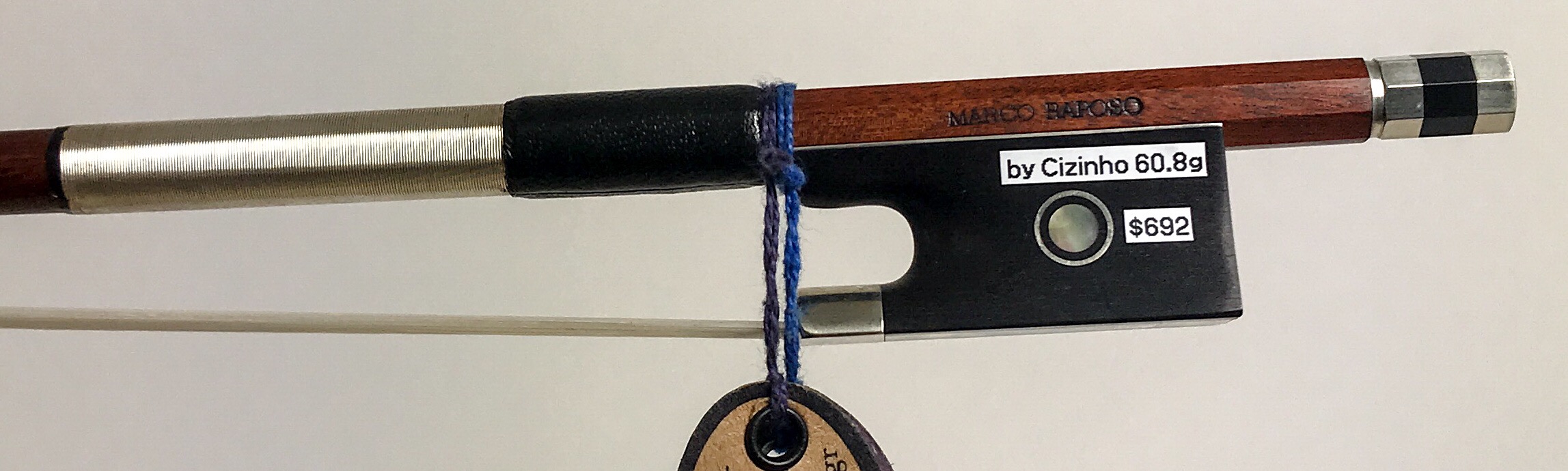 Marco Raposo - VNN (assorted makers) Nickel fitted fine quality Pernambuco sticks, Parisian eye ebony frogs Violin - $692 / Viola / Cello / Bass Pernambuco specie, round section. Mounted and wound with nickel and leather thumb grip. Marco Raposo bows use reclaimed pernambuco. This means that the wood comes from old fences, old constructions and railroad ties made out of pernambuco wood from the beginning of the 20th century. For more information on the reclaimed pernambuco that Marco Raposo uses for his bows please visit www.pernambucowood.com