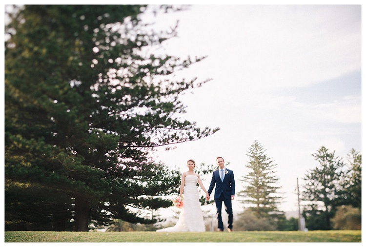 palm beach wedding couple with tree