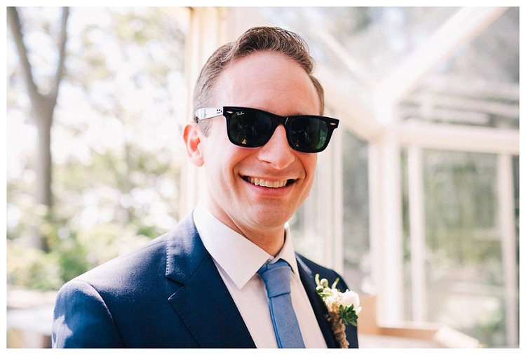 groom in sunglasses