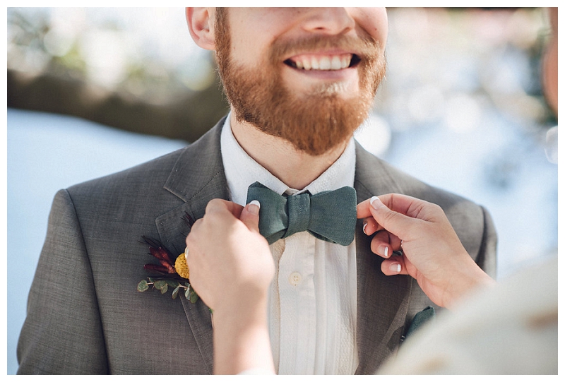 groom's suit and bowtie