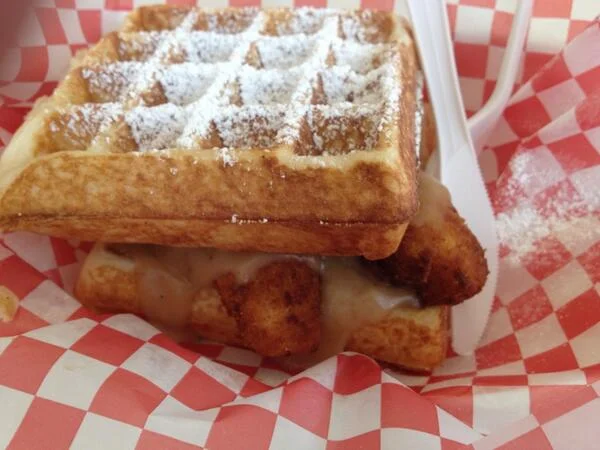 Chicken and Waffles, with Beaks signature Bacon Jam, Beaks made gravy all sandwiched between two Belgian Waffles