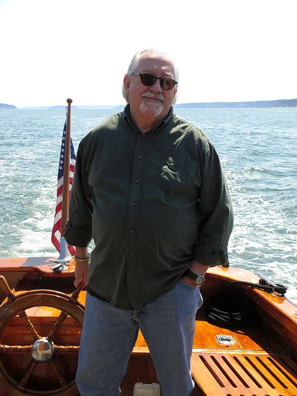 Capt. Gerardo at the helm in Saratoga Passage