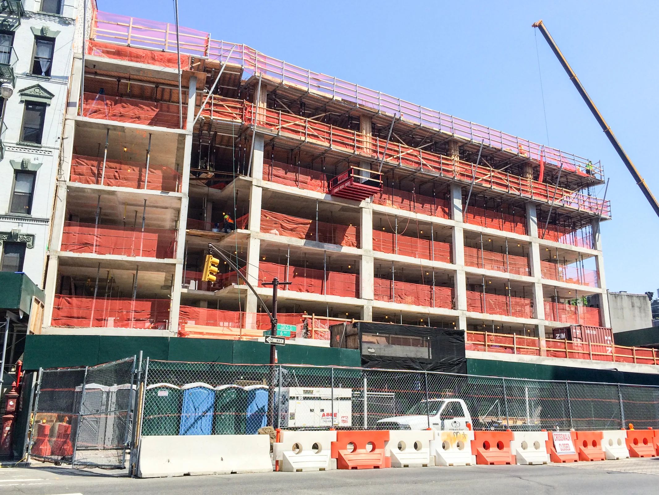 The west facade along Sixth Avenue.