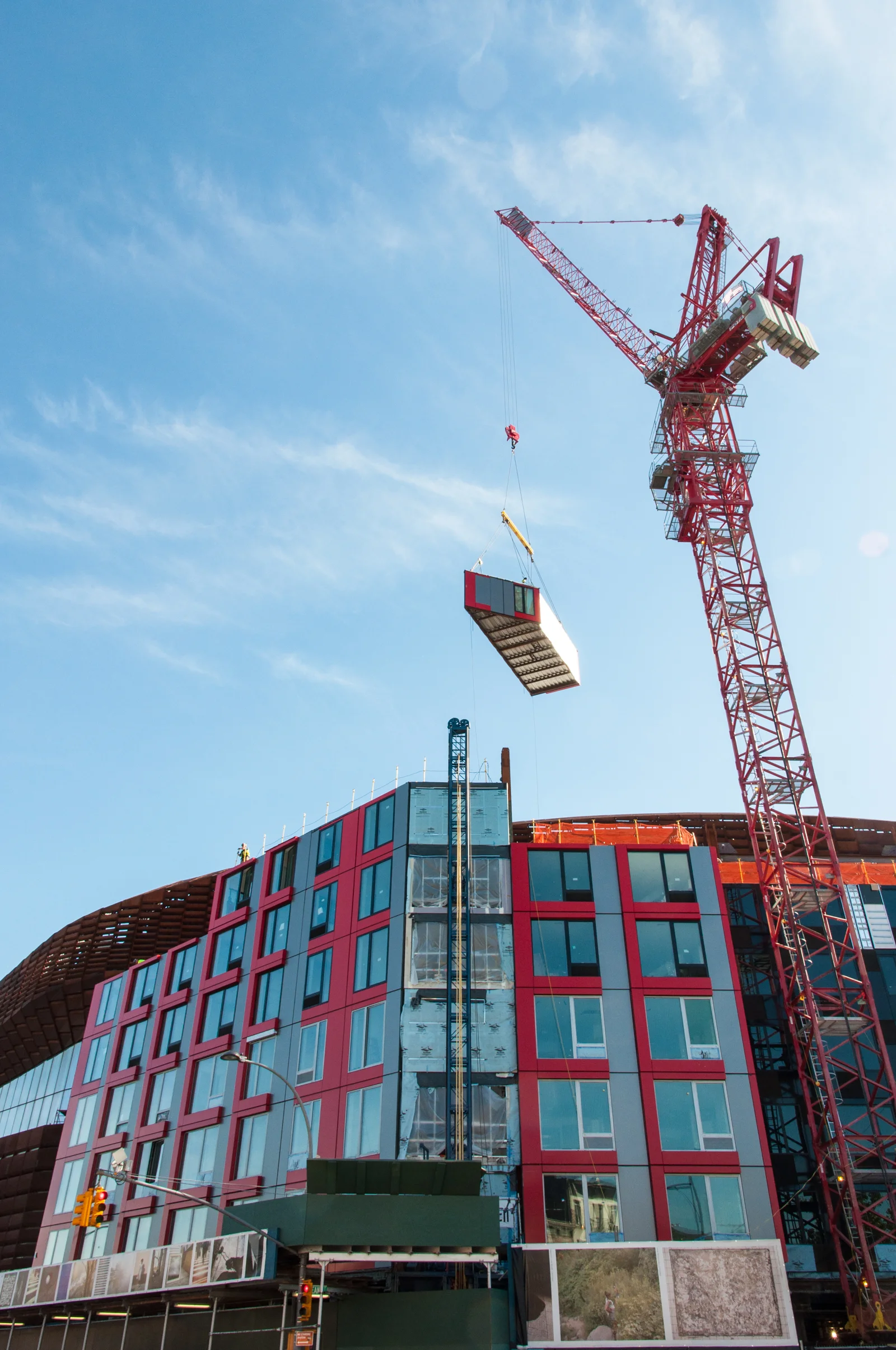 A Dean Street module lifted for installation.