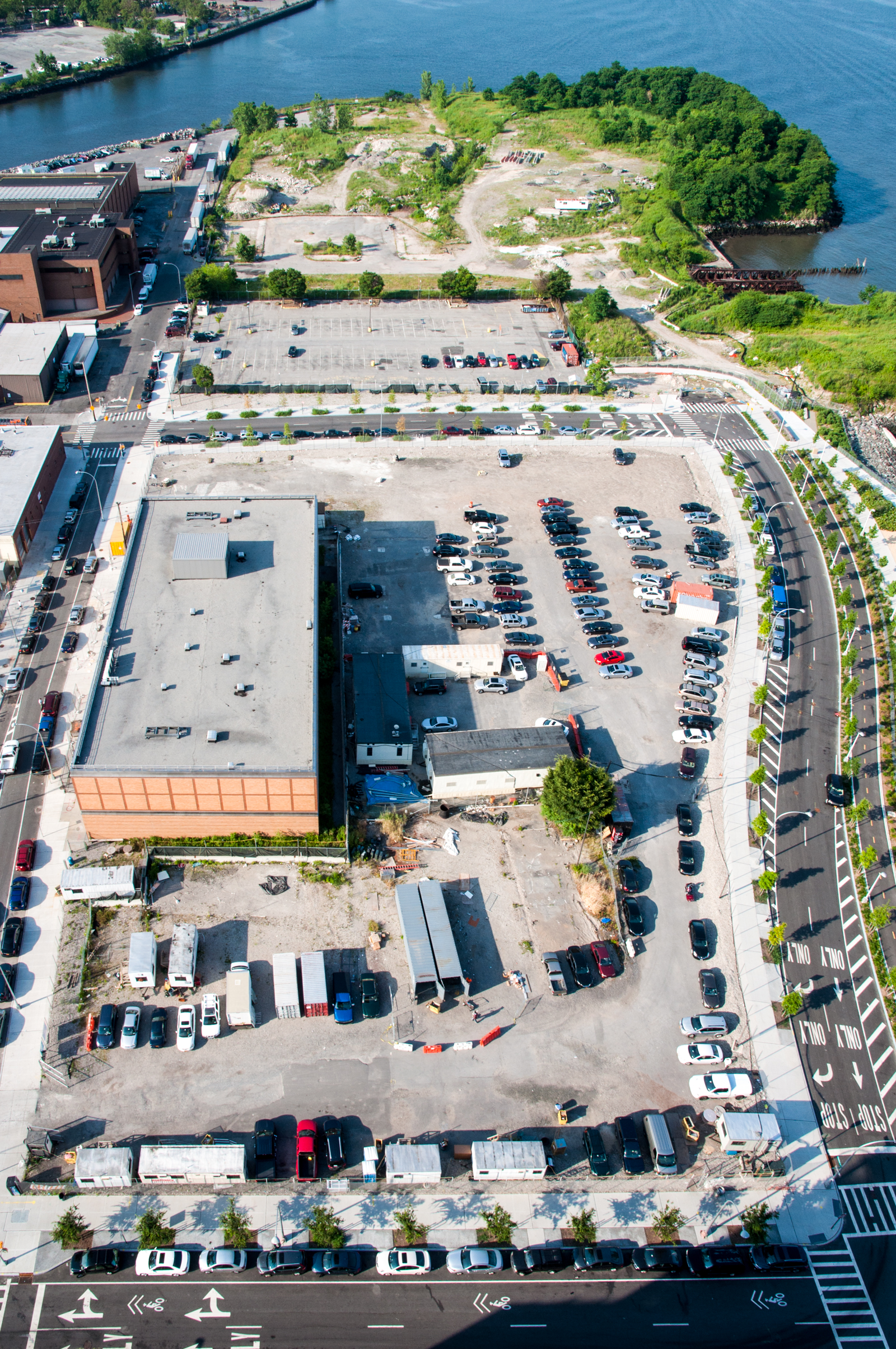 A view from Building B of the sites for future phases of Hunters Point South. A two tower building by ODA Architects will be located on Parcel C (foreground) with future buildings located on land directly to the south. 