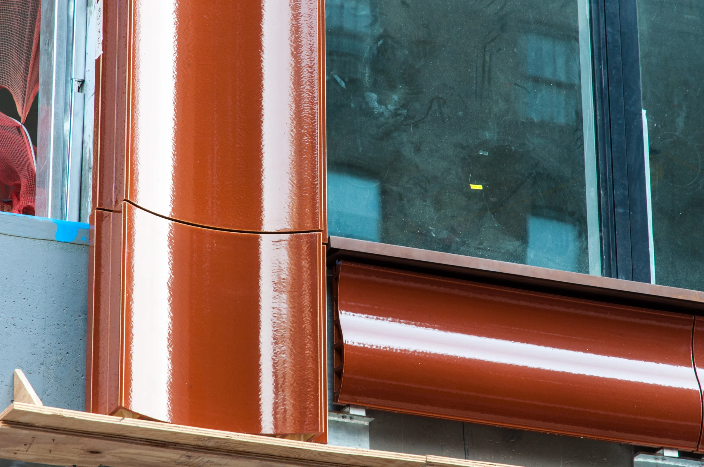 Detail of the terracotta panels at the window sill.