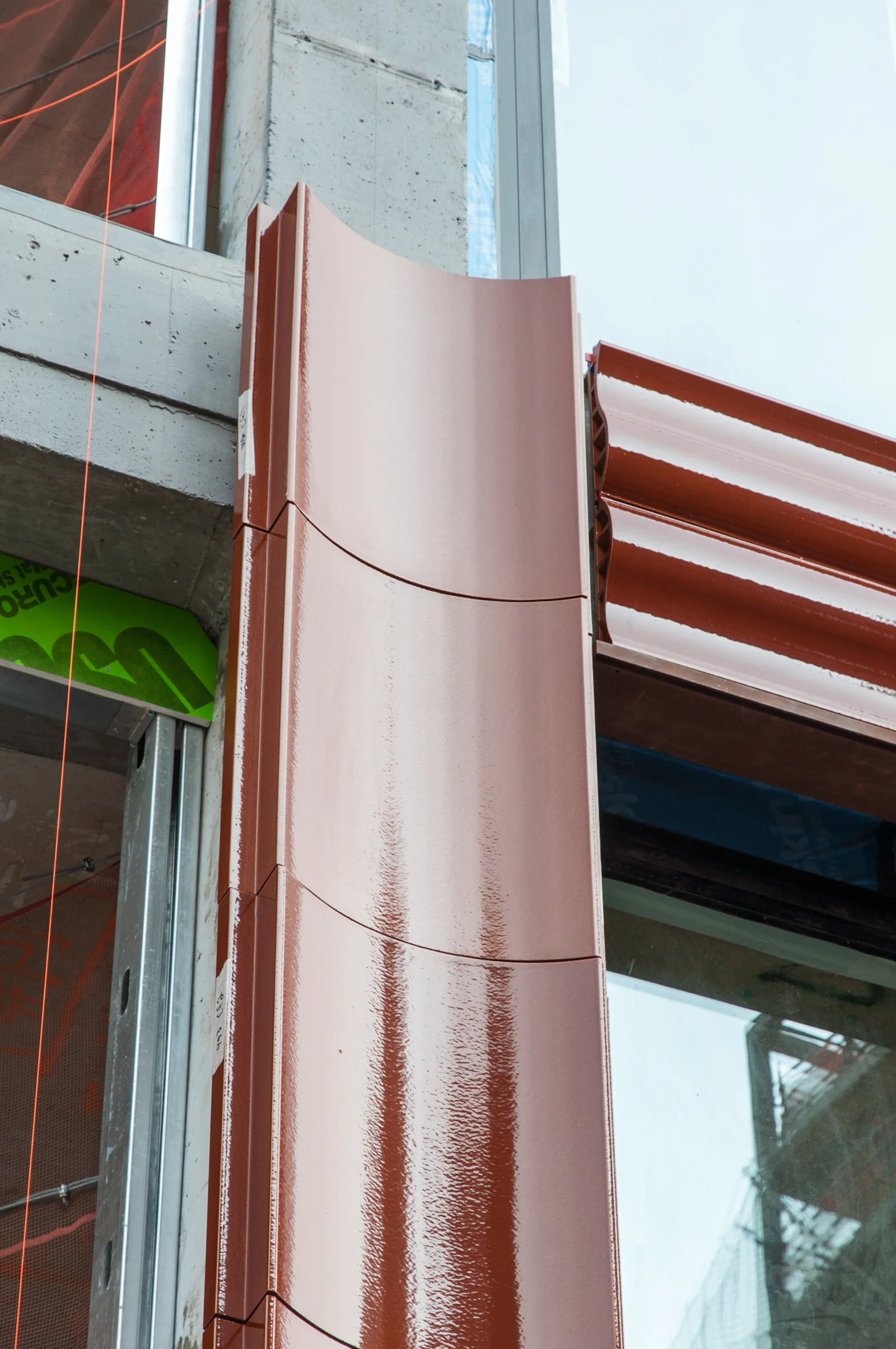 Detail of the terracotta panels at the window head.