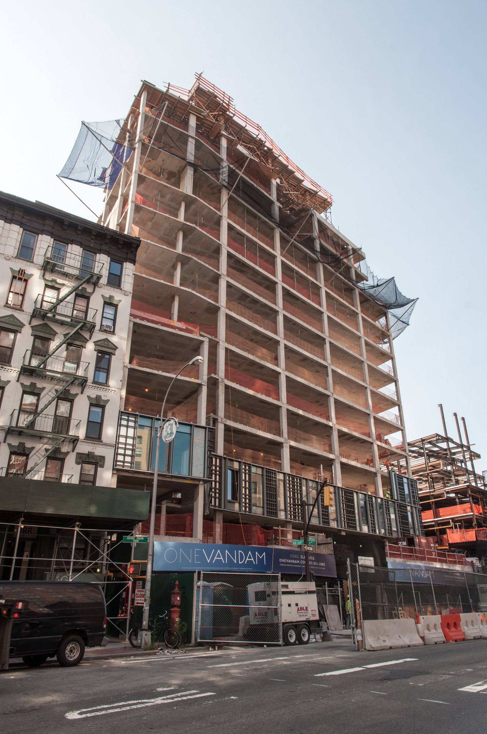 Looking south along Avenue of the Americas with the 166 Avenue of the Americas expansion in the background (right).