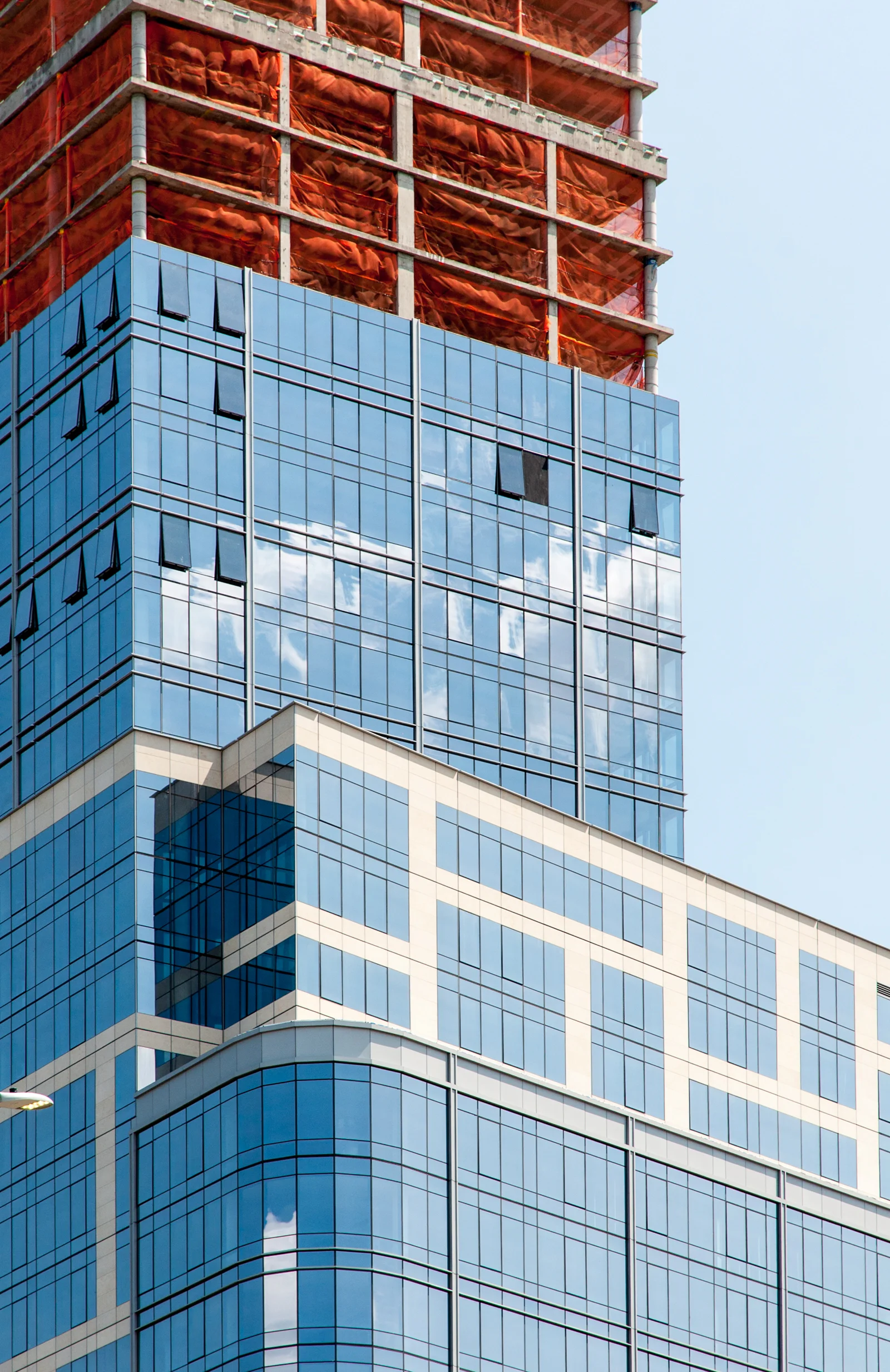 Detail of the limestone and glass façade for One Riverside Park.