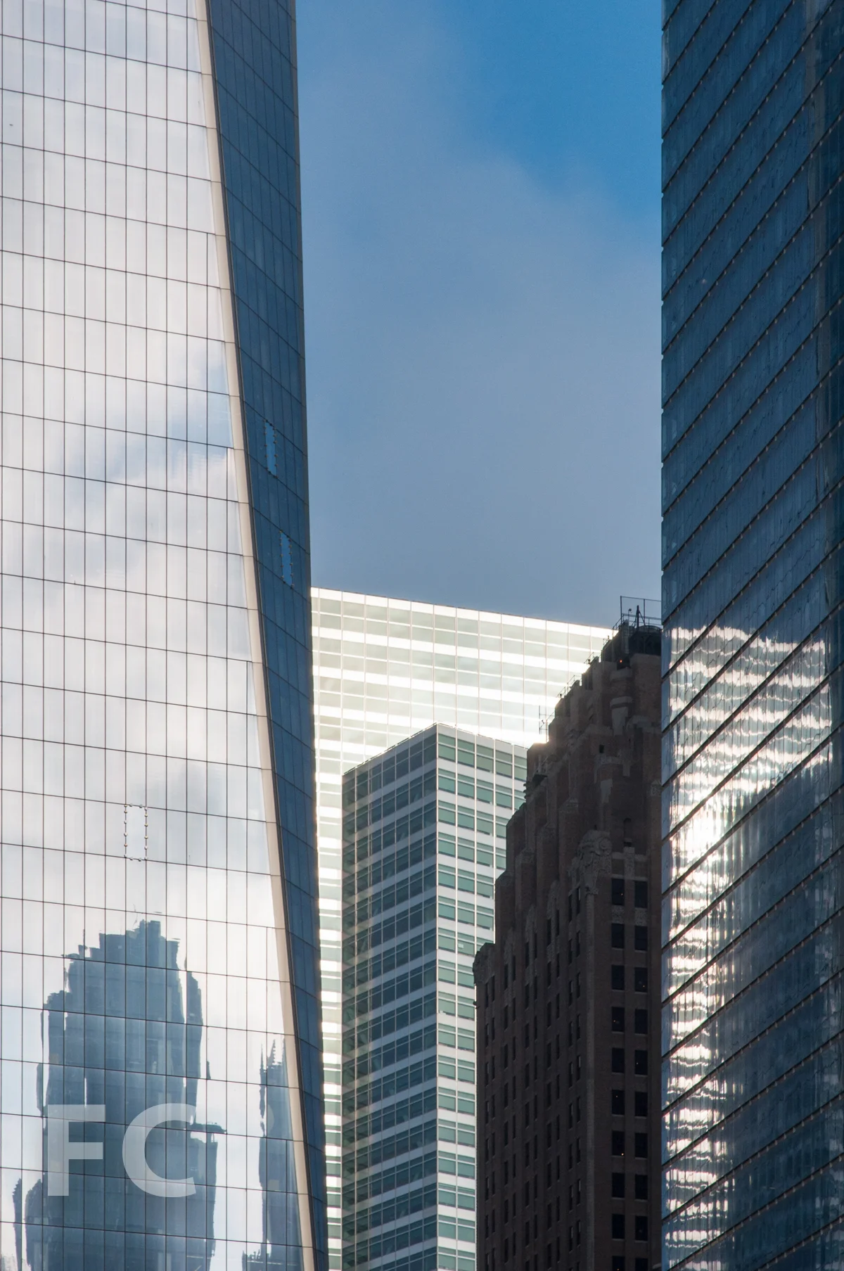 The Goldman Sachs Tower (center) amongst 1 WTC (left) and 7 WTC (right).