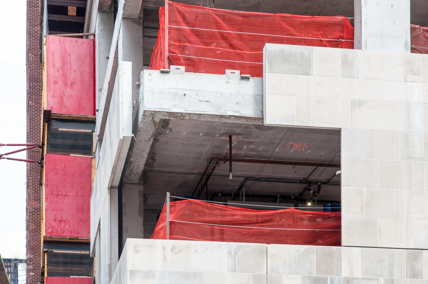 Corner detail of the limestone cladding.