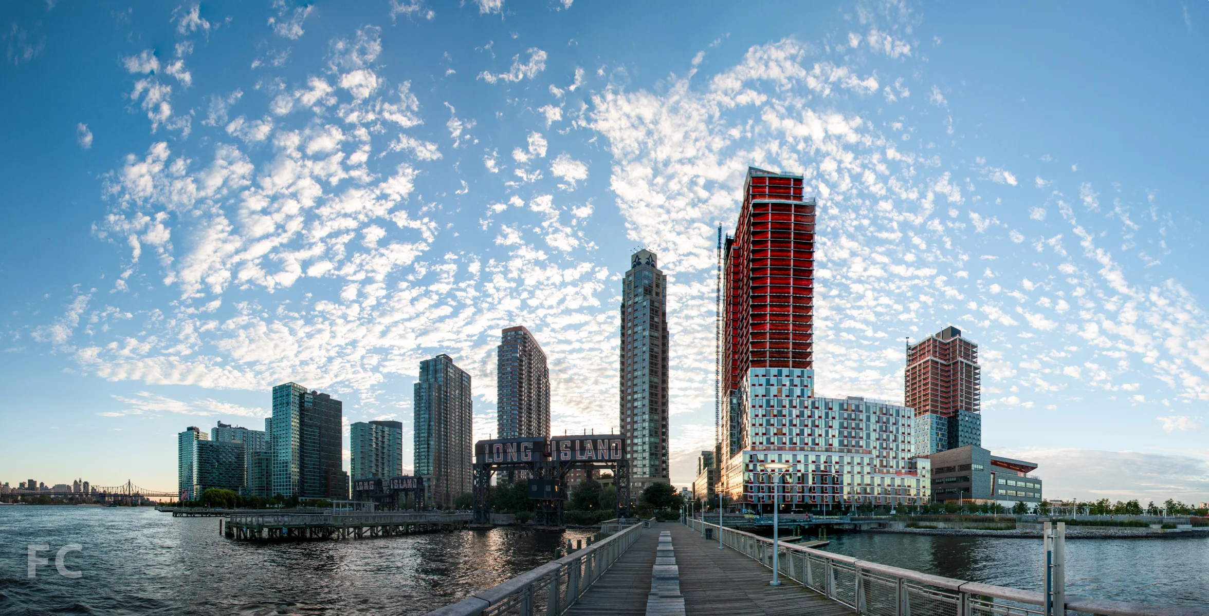 Sunrise over Long Island City from the pier of Gantry Plaza State Park.