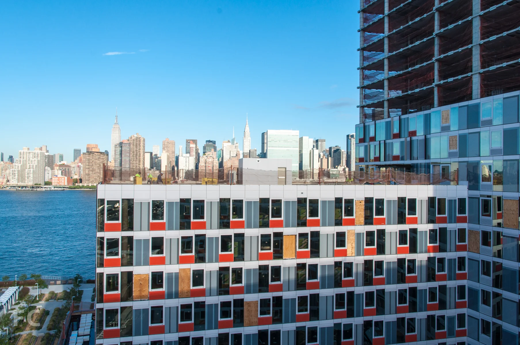 The view of the Manhattan skyline from a lower level roof deck on Building A.