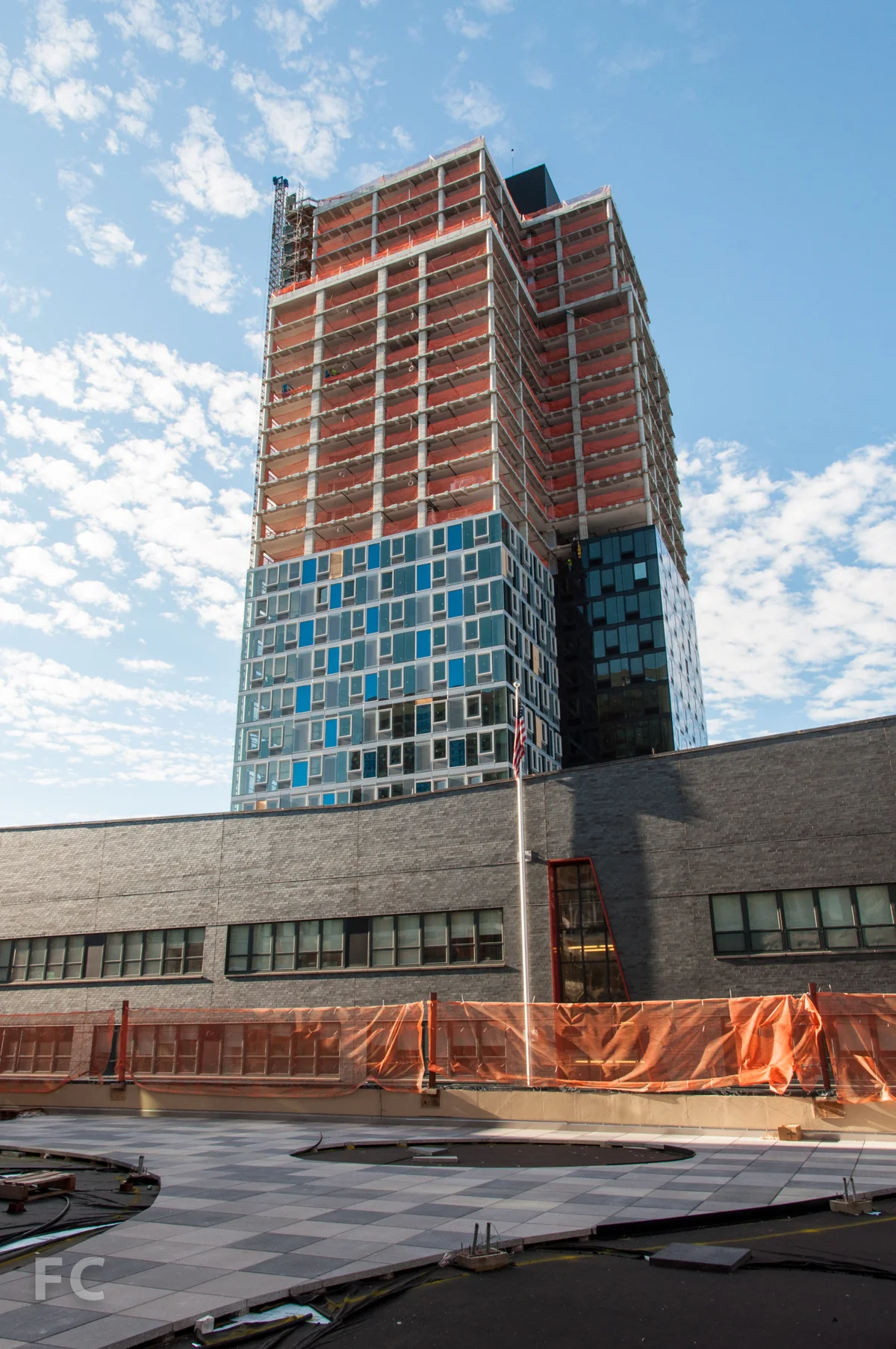 The north façade of Building B from the podium roof deck of Building A.