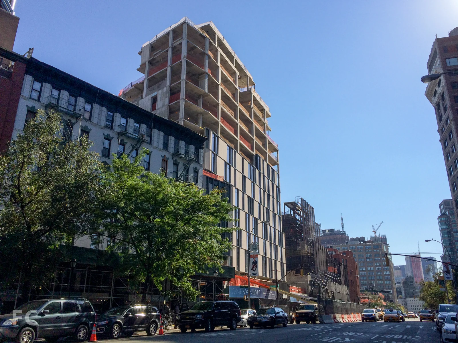 Looking south on Avenue of the Americas towards One Vandam (center) and 166 Avenue of the Americas (left)
