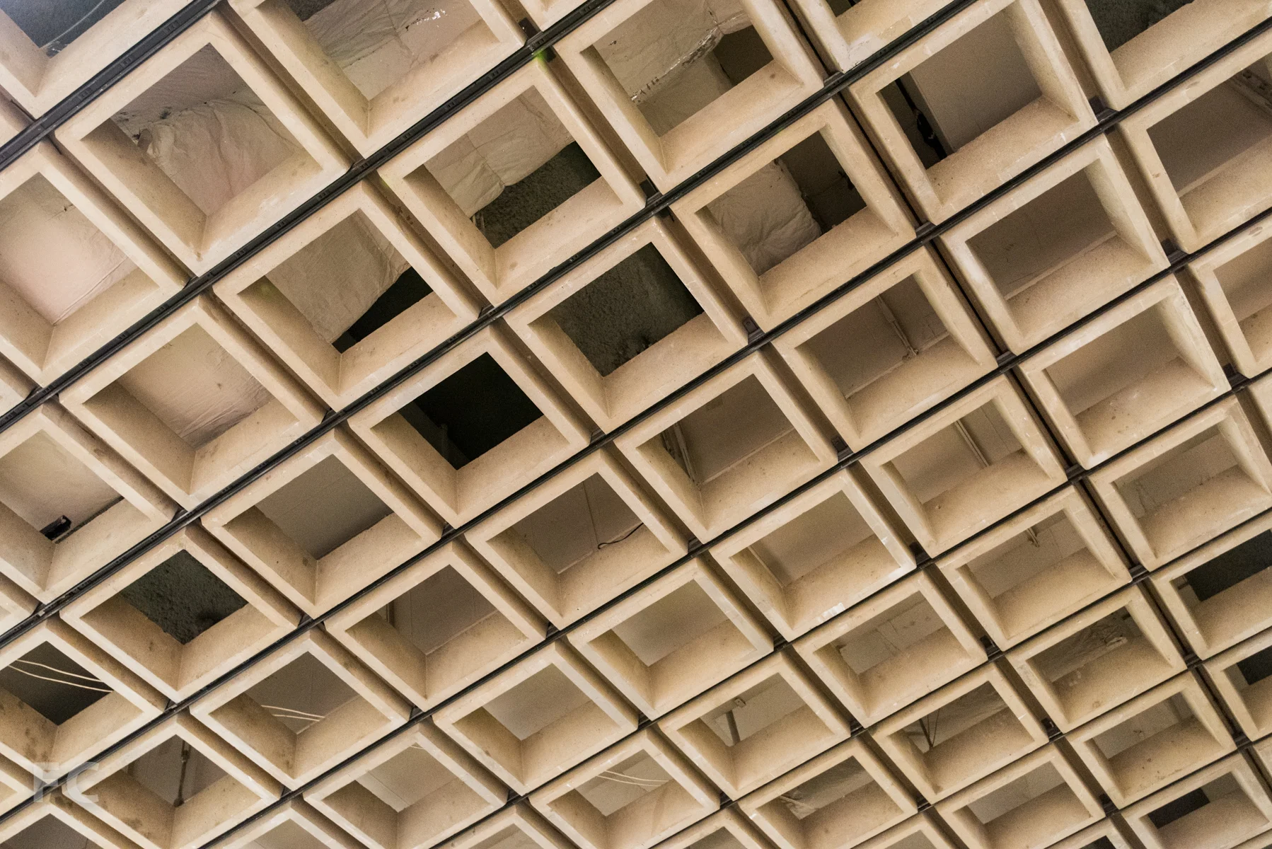 Concrete ceiling grid in the gallery.
