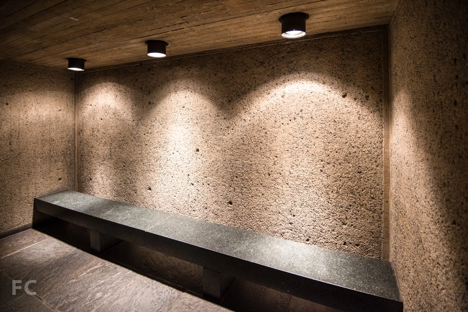 Bench inside the circulation stairwell.