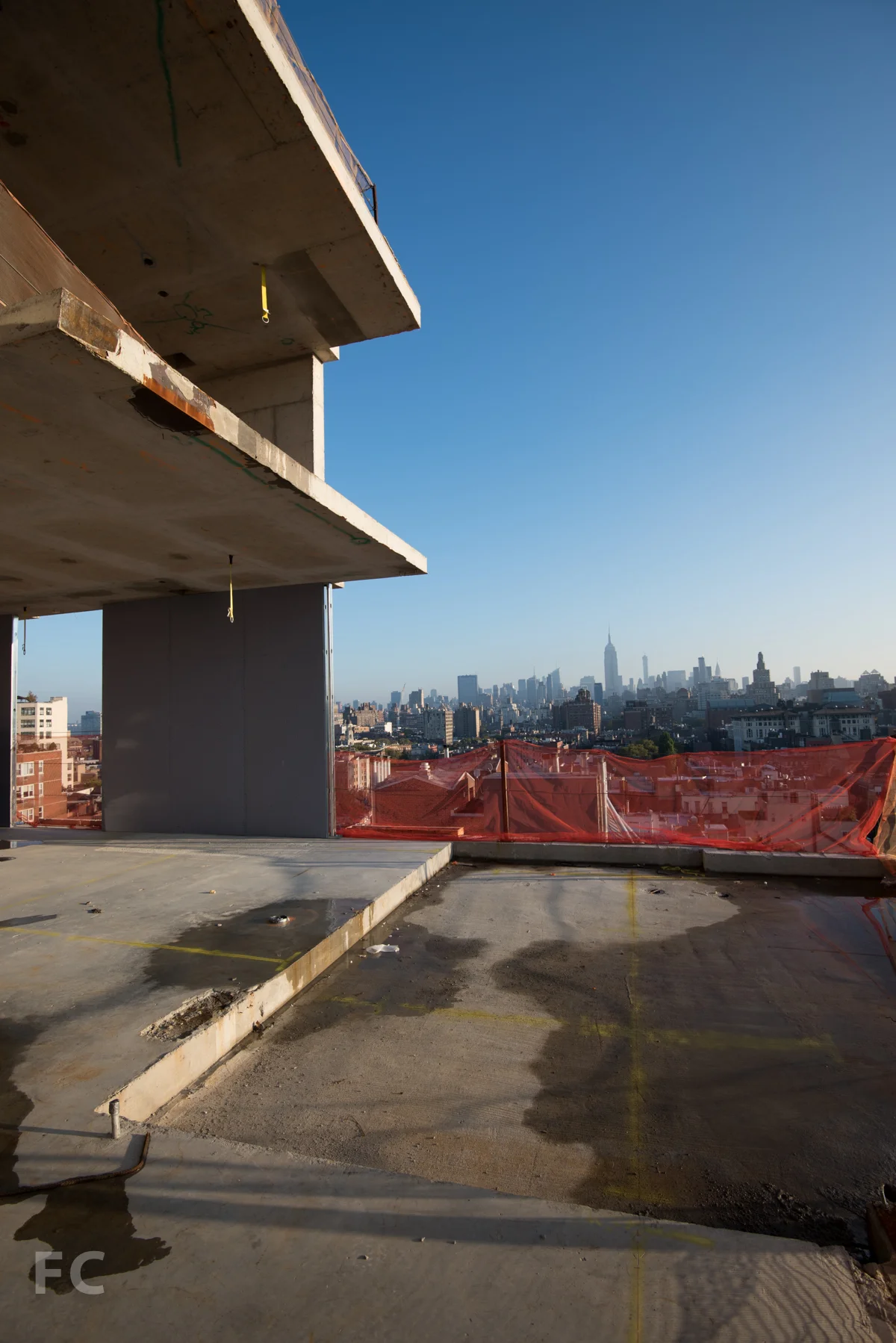 Looking north to Midtown from the outdoor terrace of Penthouse B on floor 12. The living room, master bedroom, and roof terrace levels of the duplex penthouse (left) look onto the terrace.