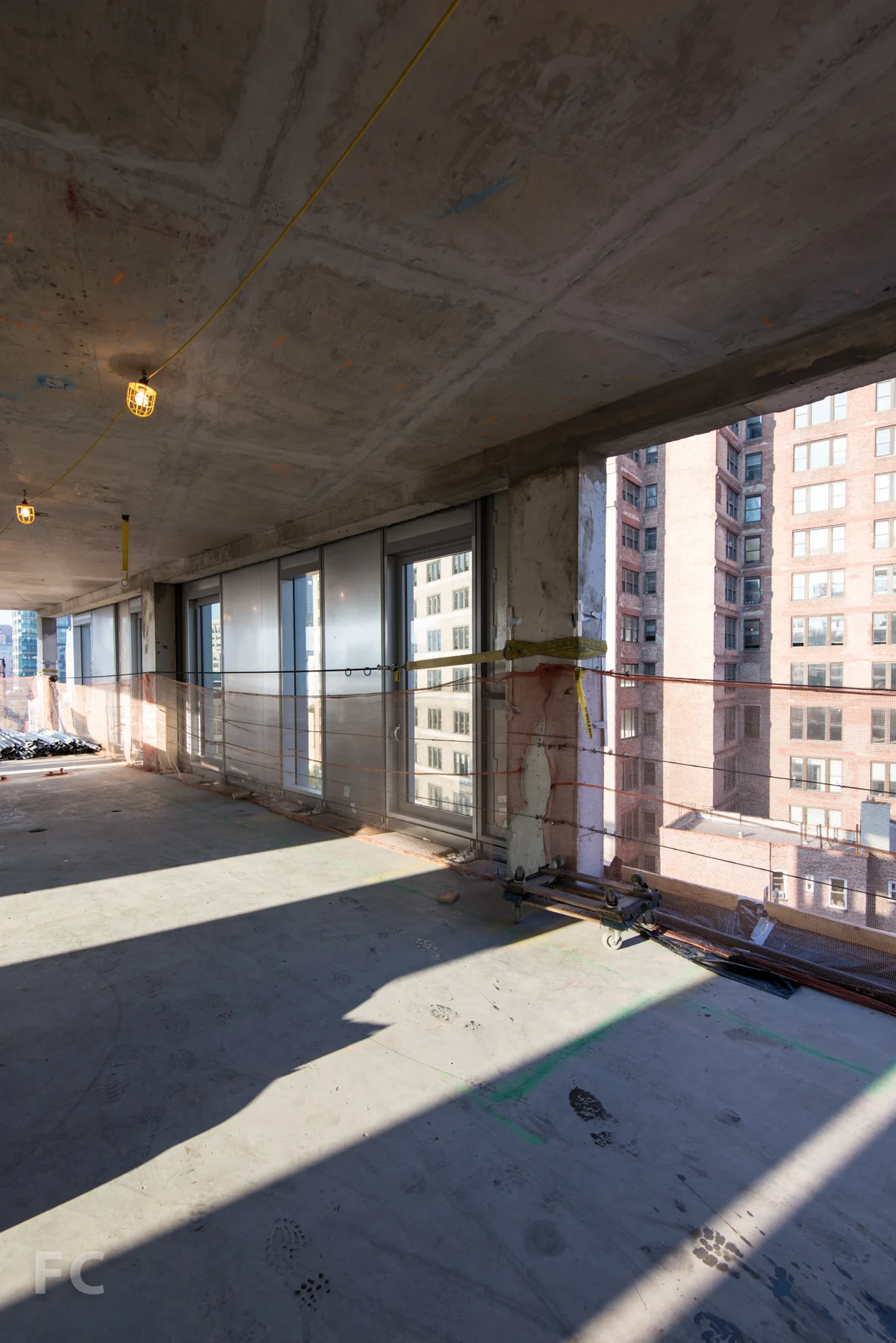 Residential floor with limestone facade panels installed.