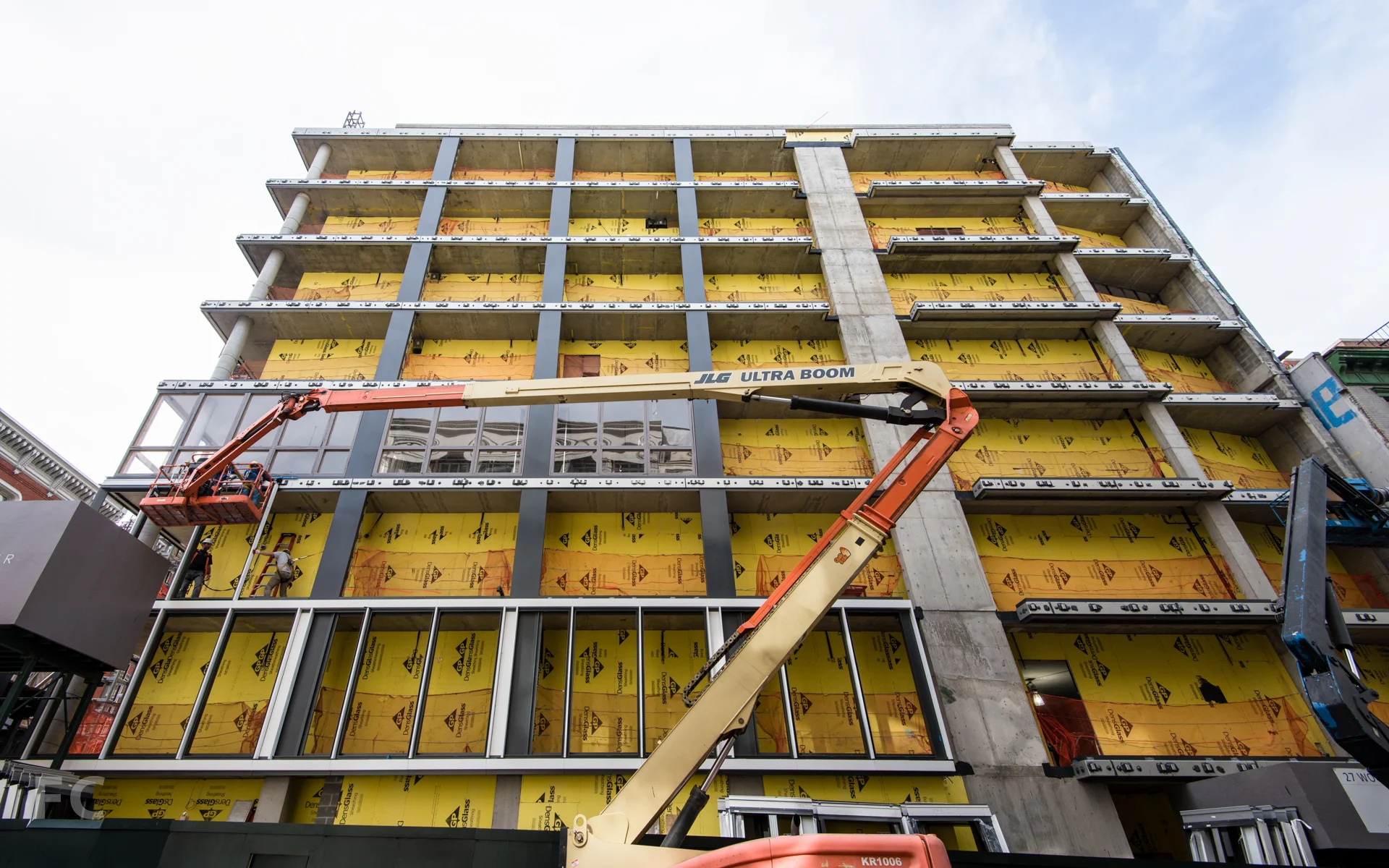 Installation of the facade frame on the north facade.