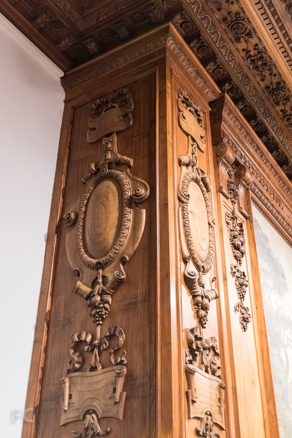 Detail of the fireplace's walnut paneling.