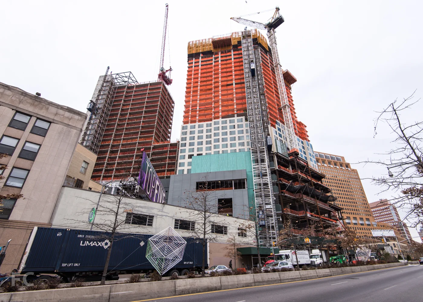 East facade of the affordable housing tower (left) and the market rate tower (right).