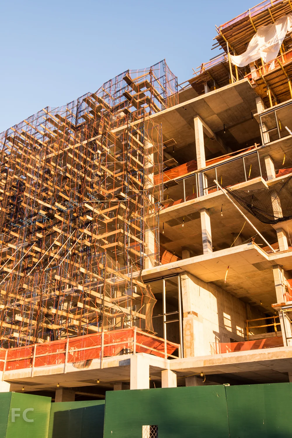 Facade scaffolding going up at the Pierhouse's condo building.